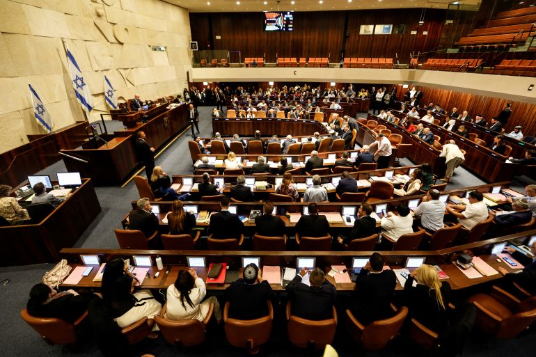 /images/noticias/Israeli lawmakers gather at the Knesset plenum to vote on a bill that would limit some Supreme Court powers.jpg